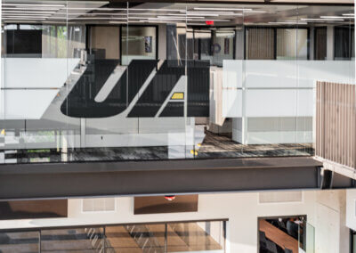 United Alloy glass walls with branding
